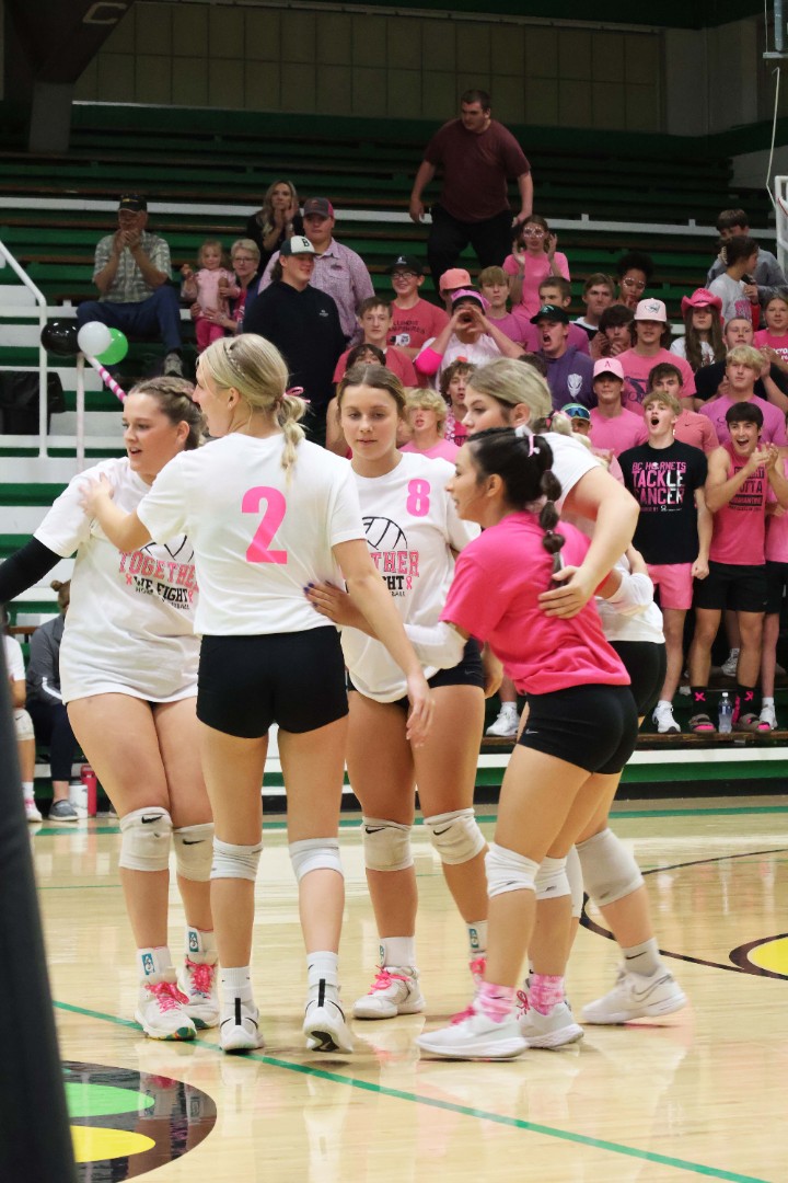 volleyball team celebrating